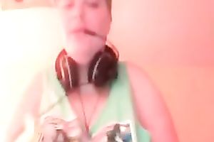 Green haired slutty amateur web camera nympho showed off her massive breasts