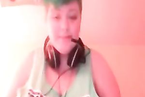 Green haired slutty amateur web camera nympho showed off her massive breasts