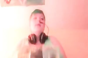 Green haired slutty amateur web camera nympho showed off her massive breasts