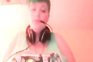 Green haired slutty amateur web camera nympho showed off her massive breasts