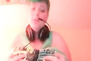 Green haired slutty amateur web camera nympho showed off her massive breasts