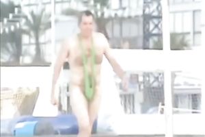 Sexy babe on the beach lets her boyfriend rub her muff