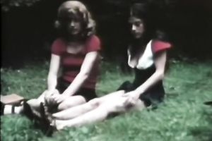 Two ravishing vintage white honeys in the garden playing with every other