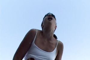 Skanky brunette hair legal age teenager finger copulates her moist cunt outdoors