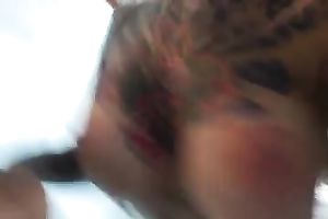 Smoking sexy tattooed sweetheart shoving palpitating slit with large dildo during the time that on web camera with me