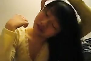 Attractive Chinese girl engulfing hard ramrod deepthroat