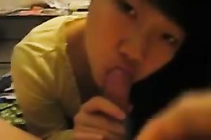 Attractive Chinese girl engulfing hard ramrod deepthroat