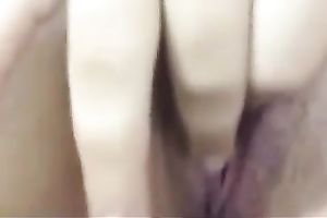 Sweet and skinny black haired BBC slut got busy with fingering her enjoyable wet crack