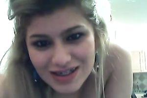 Slender nerdy legal age teenager in glasses with brackets gives me intimate cam show