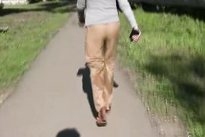 Brunette boy in khaki panties acquires all wet in the park