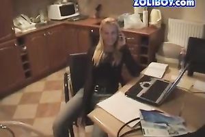 Svelte hot smiling blondie has a phone conversation