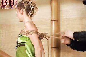 Slim and hot golden-haired hottie is bound up and stripped