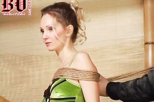 Slim and hot golden-haired hottie is bound up and stripped