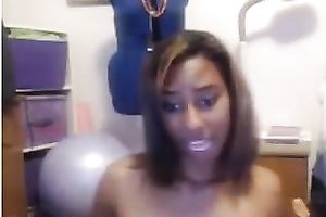 Alluring hawt smiling dark honey enjoys playing with her sex toy