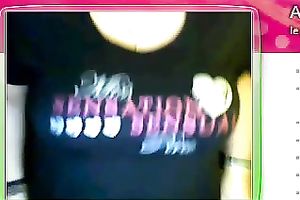 Fat granny sits in front of the web camera and rubs her fanny