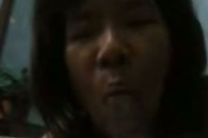 Mature Asian mama is engulfing her hubby's knob in dilettante homemade sex episode