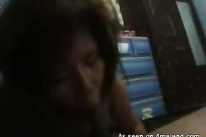 Mature Asian mama is engulfing her hubby's knob in dilettante homemade sex episode