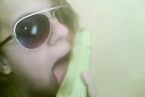 Horny and kiny bitch in sunglasses sucks the squash
