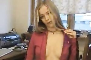 All alone lengthy haired blondie flashes her tiny billibongs during the time that stripteasing on web camera