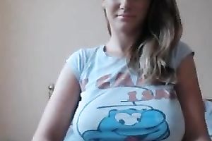 Blond haired eye catching honey got rid of her T-shirt to flash boobies
