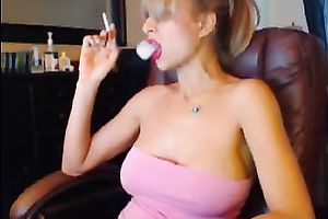 Awesome private show with a well-endowed blond smokin' a cig