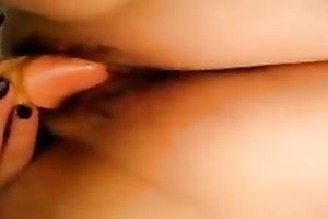 Wife likes pushing her shaggy cunt with large plastic sex-toy