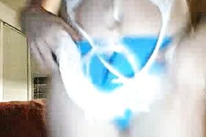 Playful blondie on the daybed shows her vagina and masturbates