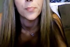 Sexy cam golden-haired honey plays around and flashes her boobies