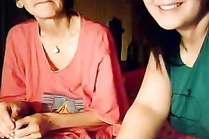 Mature floozy sitting next to recent floozy flashed her own unattractive saggy mounds