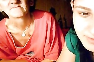 Mature floozy sitting next to recent floozy flashed her own unattractive saggy mounds