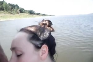 Horny and lustful whore swims to dude to blow the shlong