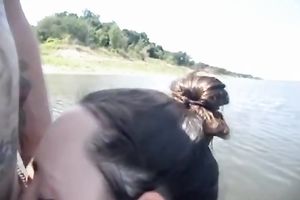 Horny and lustful whore swims to dude to blow the shlong