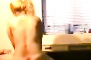 Blond haired large bottomed white lady is fond of riding man's prick