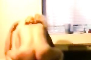 Blond haired large bottomed white lady is fond of riding man's prick