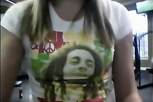 Seductive co-ed takes her clothing off in front of the camera