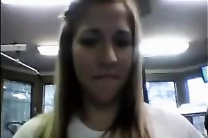 Seductive co-ed takes her clothing off in front of the camera