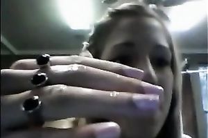 Seductive co-ed takes her clothing off in front of the camera