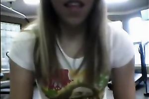 Seductive co-ed takes her clothing off in front of the camera