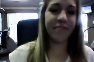 Seductive co-ed takes her clothing off in front of the camera
