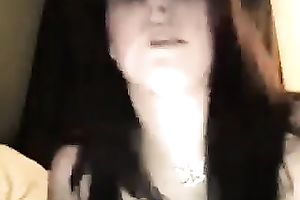 Naughty British wench smokin' cigarette whilst chatting on livecam