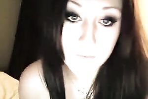 Naughty British wench smokin' cigarette whilst chatting on livecam