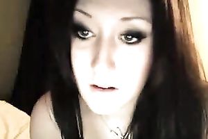 Naughty British wench smokin' cigarette whilst chatting on livecam