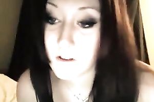 Naughty British wench smokin' cigarette whilst chatting on livecam