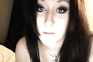 Naughty British wench smokin' cigarette whilst chatting on livecam