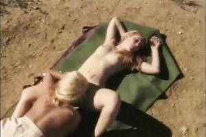 Two curvy golden-haired lesbo smack every other's vaginas in the wild