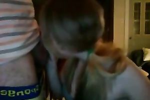 Pigtailed cute auburn girlie provided her favourable BF with BJ on cam