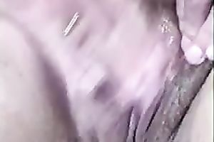 Mature neighbor stretches her twat lips with fingers