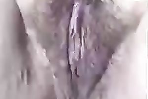 Mature neighbor stretches her twat lips with fingers