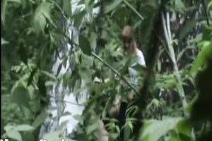 Blonde white Russian housewife in the high grass squats and piddles