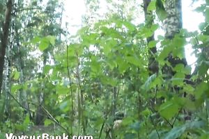 Blonde white Russian housewife in the high grass squats and piddles